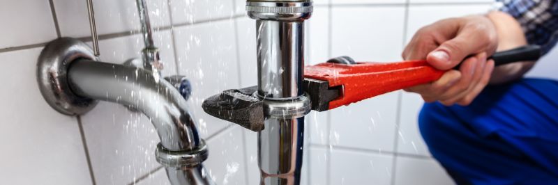 Plumber Fixing Pipe